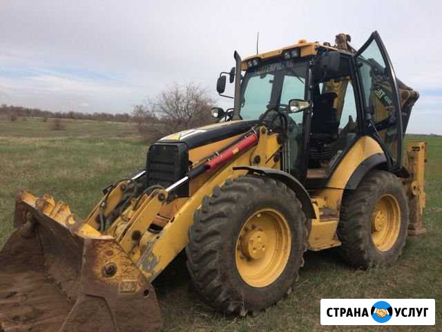 Услуги экскаватора-погрузчика Caterpillar 434E Волгоград - изображение 1