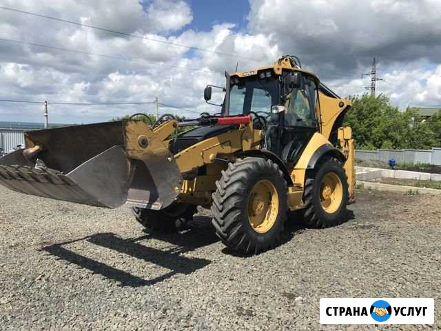 Услуги экскаватора-погрузчика CAT, Камаз Кемерово - изображение 1