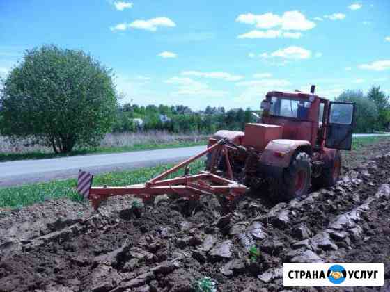 Вспашка земли трактором Истра