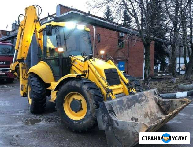 Услуги экскаватора-погрузчика Кемерово - изображение 1