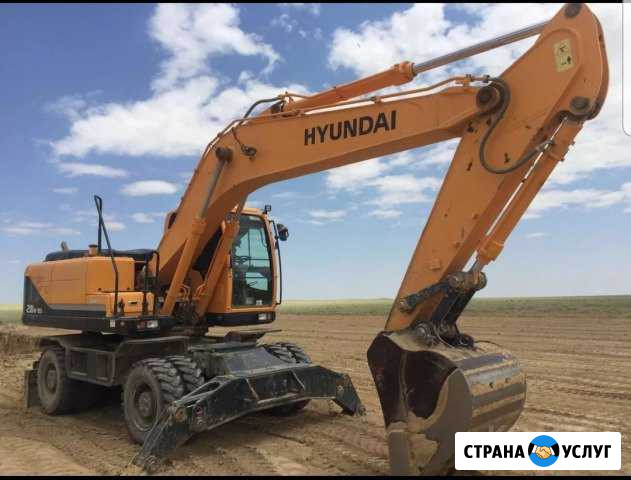 Услуги эксковатора Hyundai Колесник - 210 Иркутск - изображение 1