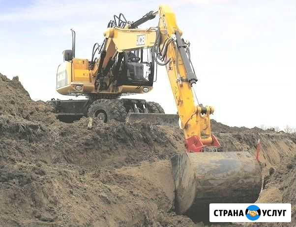 Экскаватор полноповоротный калесный с бурилкой Сочи - изображение 1
